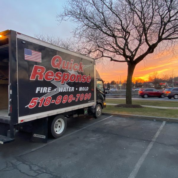 A Truck Is Parked On The Side Of A Road